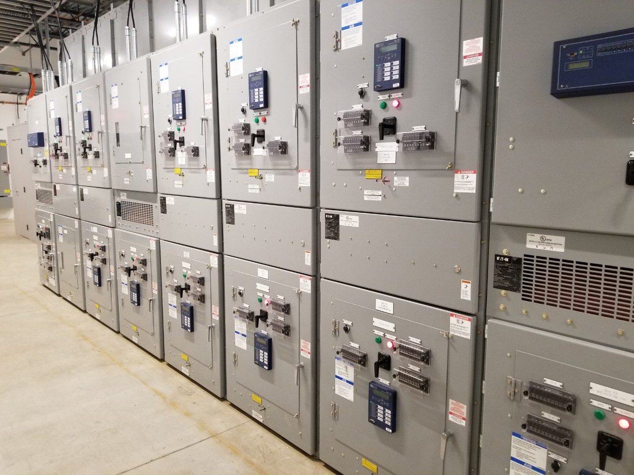 What are the essential features of Switchgear?