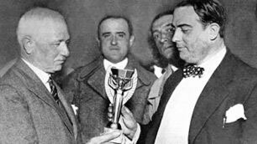 Jules Rmit and Henri Delauney holding the first ever FIFA World Cup Trophy